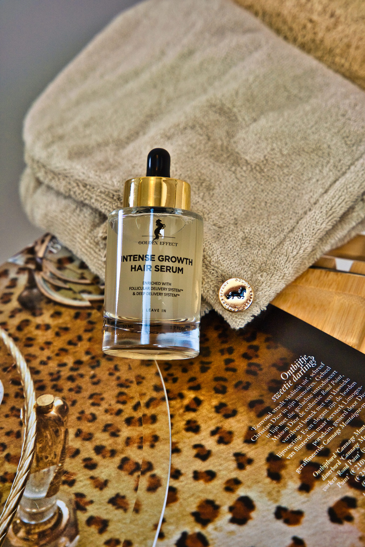 Golden Effect hair serum packshot on textured styling